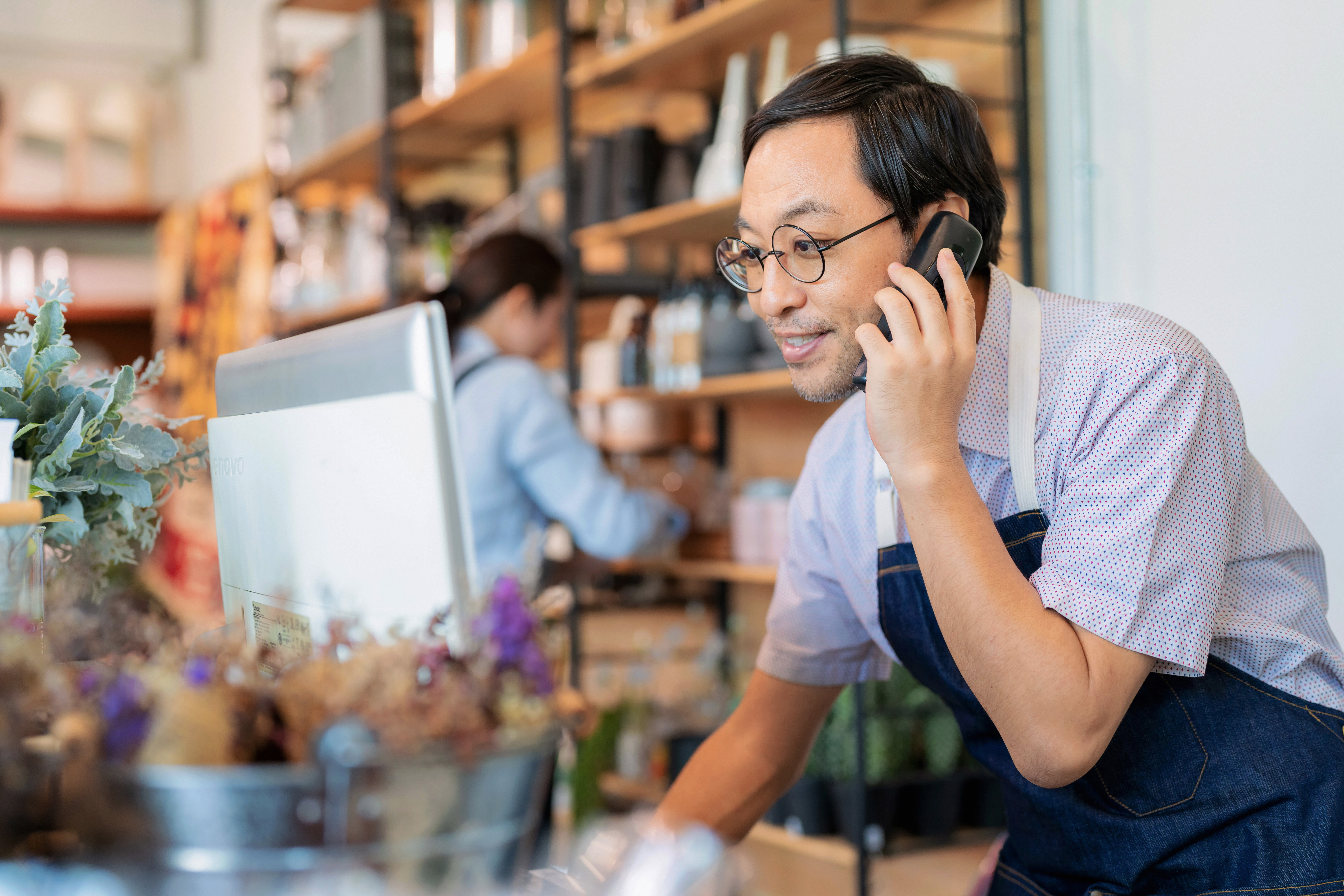 Providing services and solving problems for customers to impress and make customers satisfied. Product owner manager receive call from customer and explain the instruction how to use to customer. Online shopping meets the needs of the new generation. stock photo