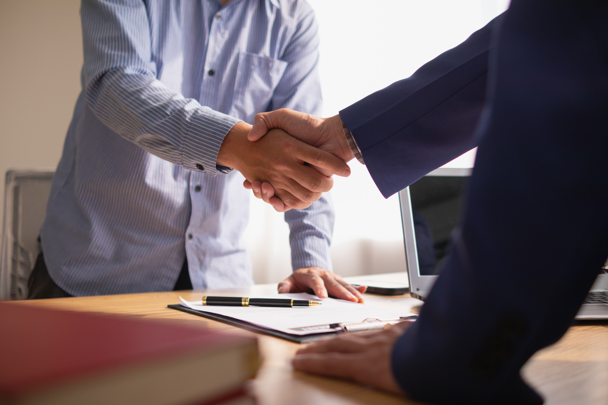 succession planning shaking hands 
